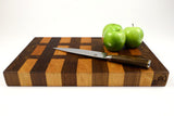 Side mid-angle of Cherry Walnut Lattice with knife and fruit for scale