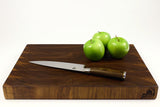 Side mid-angle of Walnut Wave with knife and fruit for scale