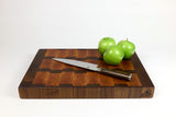Side mid-angle of Blocky Road with knife and fruit for scale