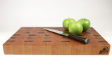 Side mid-angle of Grain & Dash with knife and fruit for scale