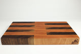 Wooden cutting board with a checkered pattern on a white background