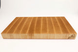 Side view of Board Single - MapleMagic from ~45°, logo facing camera