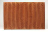 Side view of BoardCherry35 from ~45°, logo facing camera