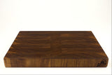 Side view of Walnut Wave from ~45°, logo facing camera