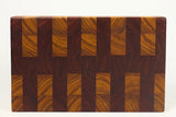 Top-down view of Red Canary — Canarywood and Padauk end-grain cutting board, 14″ × 8.75″ × 2″