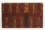 Top-down view of Canary Sunset — Canarywood and Padauk end-grain cutting board, 14″ × 8.5″ × 2″