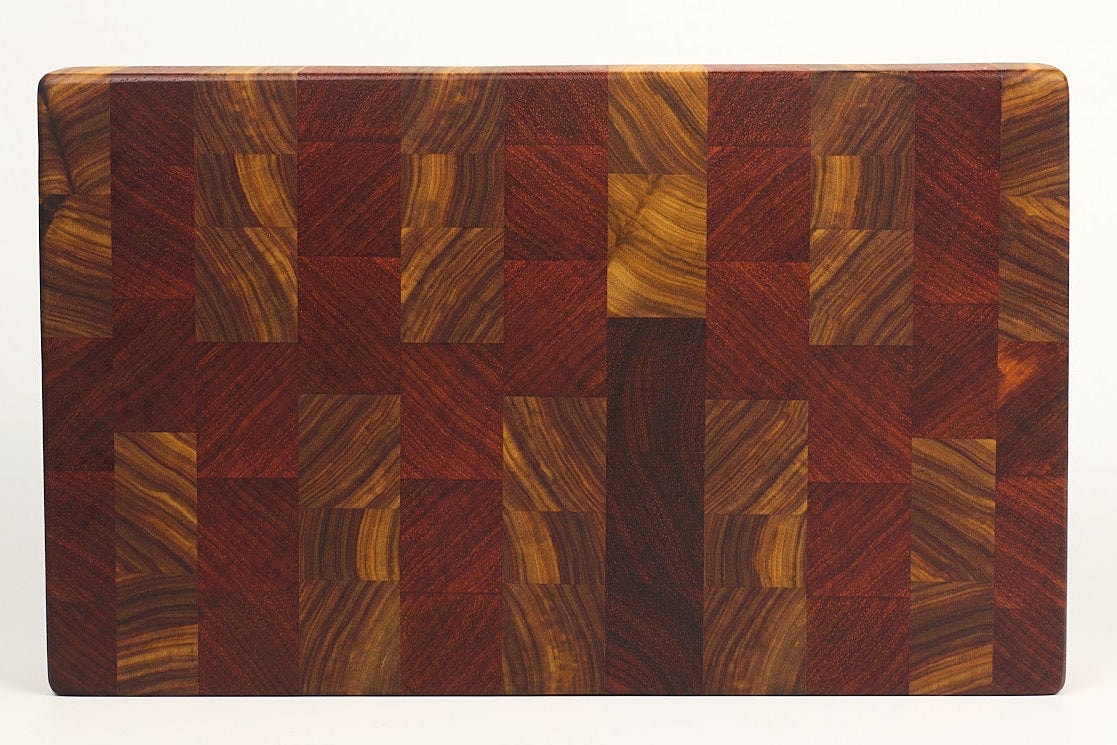 Top-down view of Canary Sunset — Canarywood and Padauk end-grain cutting board, 14″ × 8.5″ × 2″
